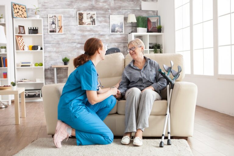 Happy old woman in a nursing home