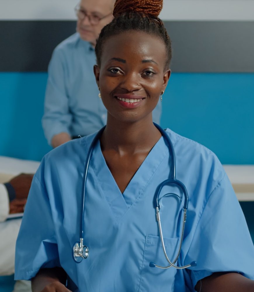 Close up of woman working as nurse sitting at desk and reading documents, files, papers of patient checkup. Person wearing uniform and stethoscope in healthcare cabinet at facility